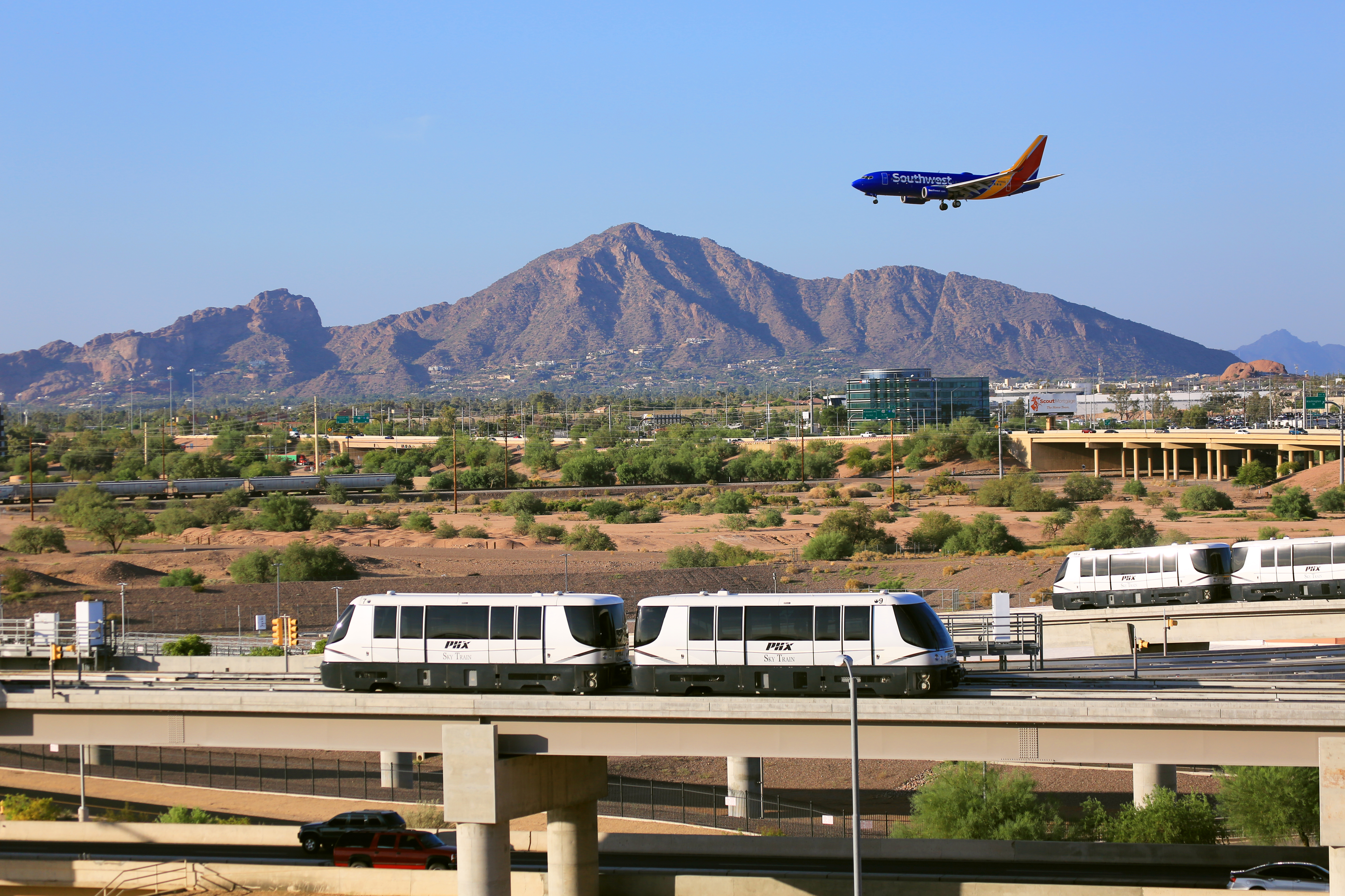 PHX Sky Train on Camelback with View of Southwest Plane