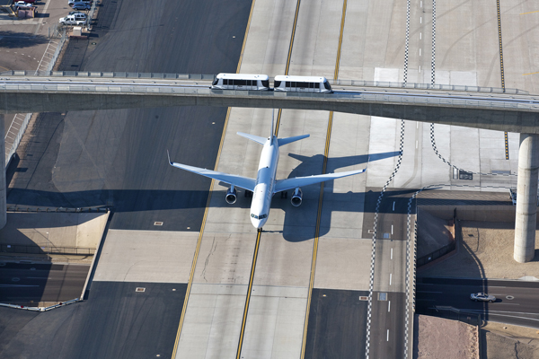 PHX Sky Train with View of Plane on Taxiway