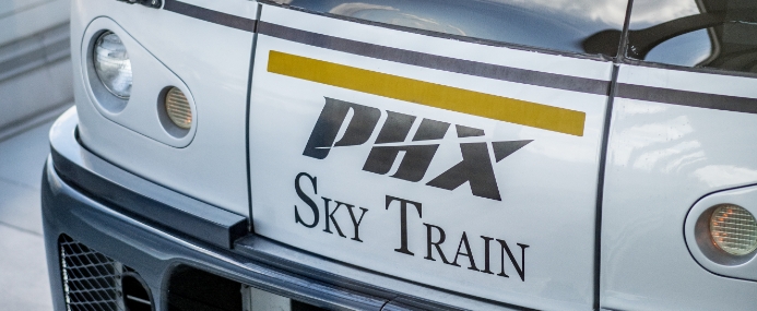 Sky Train car logo in a closeup.